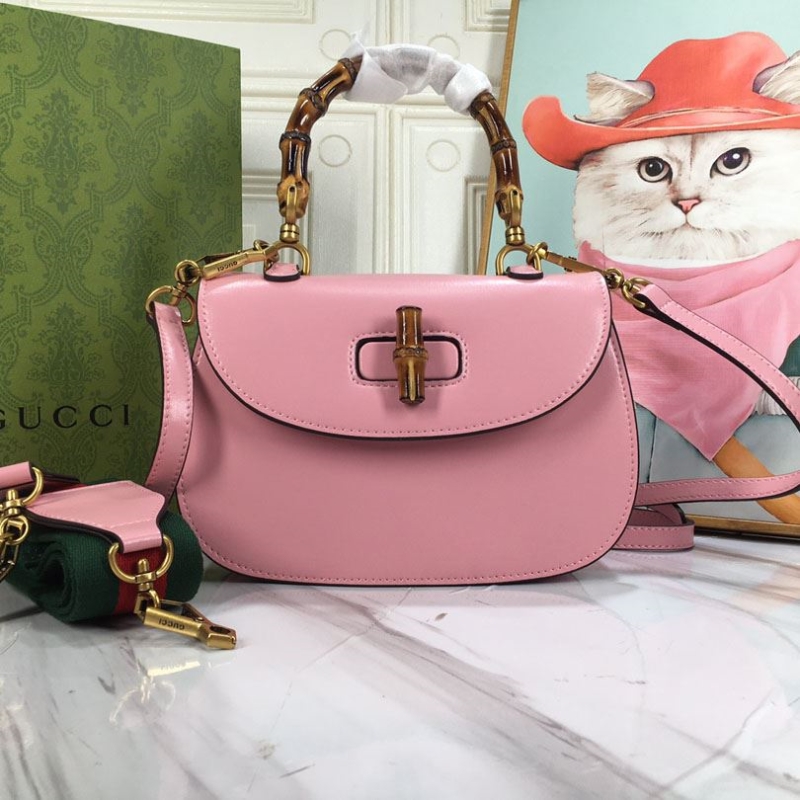 G*u*i top handle bags